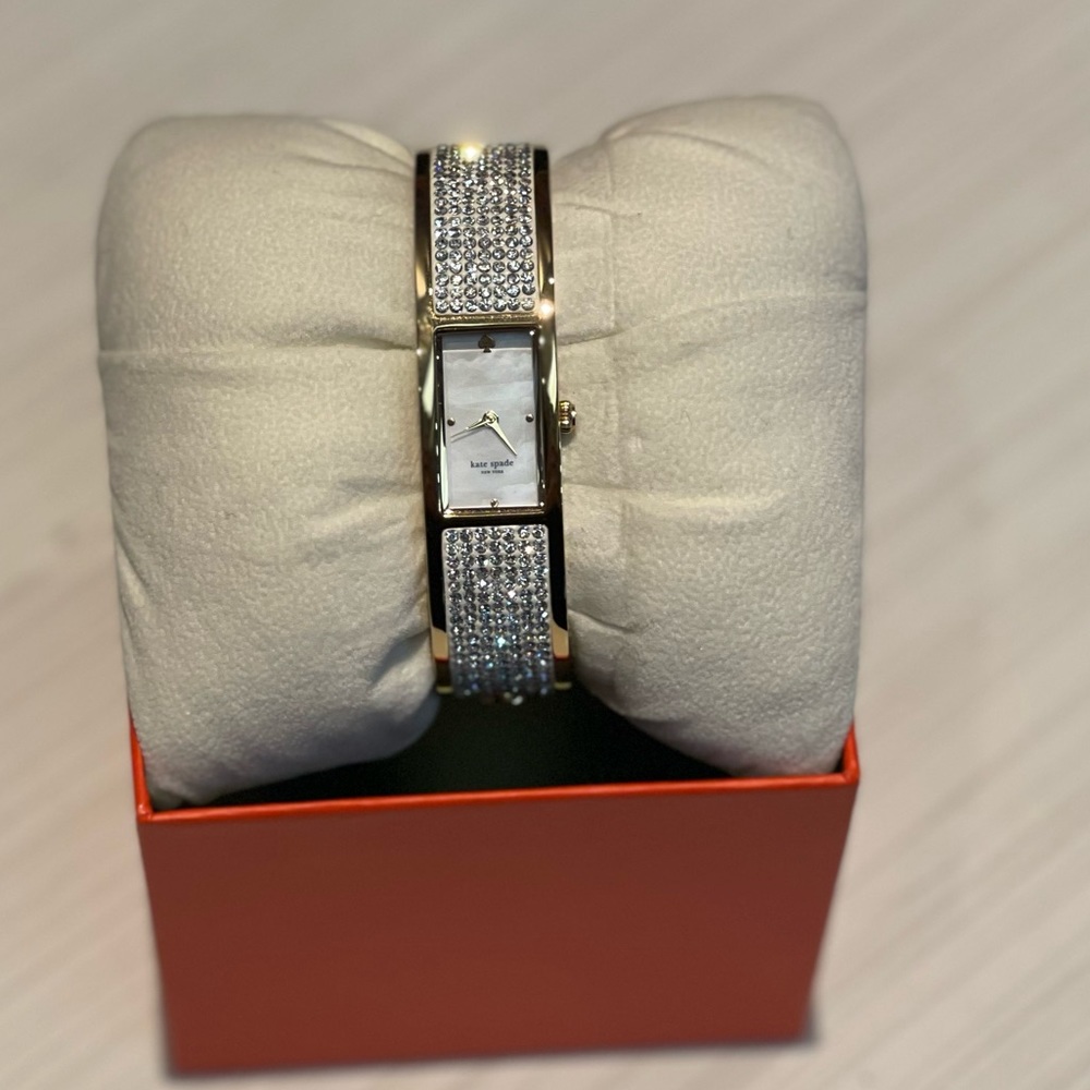 Kate spade “on the rocks” carousel bangle watch